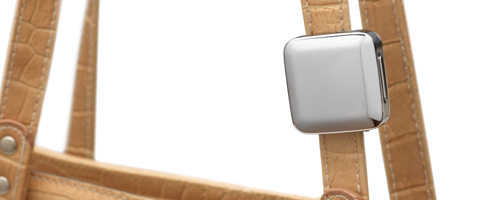 Bluetooth Notification Device clipped to a bag